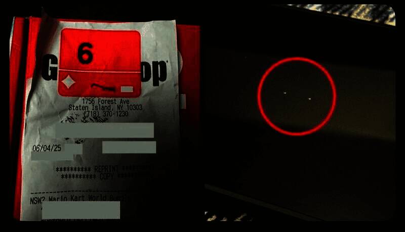 GameStop门店内部场景，员工正在检查新的包装流程