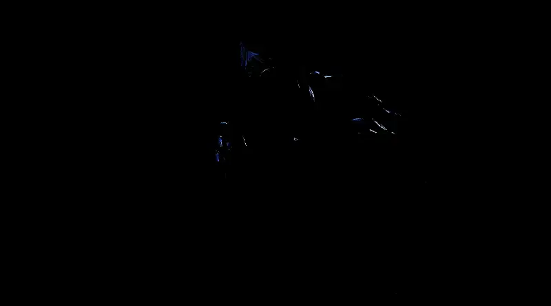 光荣特库摩总部大楼外景，阳光洒落在现代化建筑上