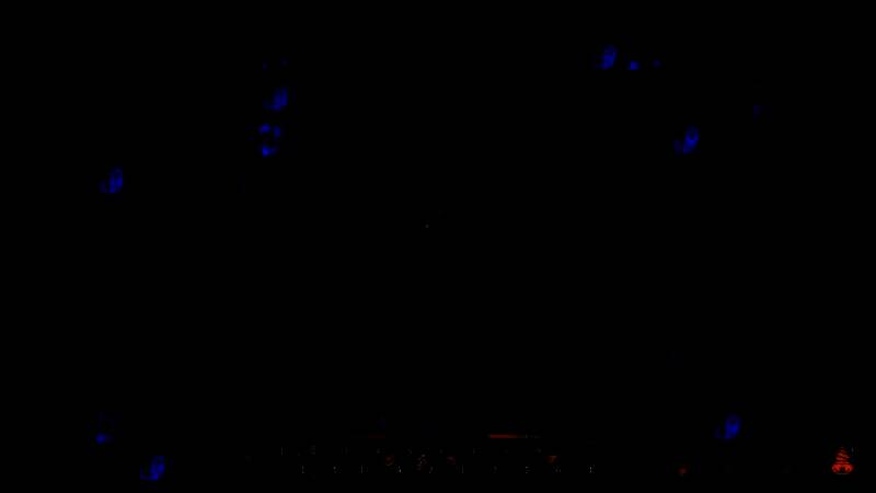 营地内部全景展示，工作台与家具摆放整齐，灯光温馨