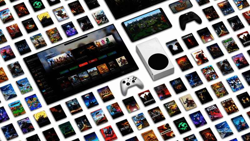 Iain MacIntyre工作场景照片，背景可见Xbox标志及Game Pass相关文档