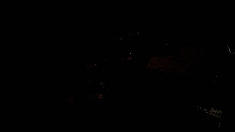 废土城市建造场景，定居点在废墟中拔地而起，背景为荒凉大地与风暴