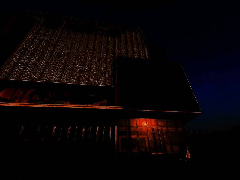 活动现场合影墙，多位玩家手持周边与蛋仔立牌合影留念