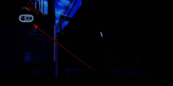 一只橘色小猫趴在ATM机顶上，眯着眼睛晒太阳，姿态惬意