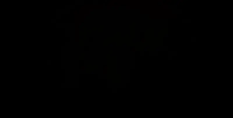 地下洞穴，钟乳石垂落，地面有发光苔藓