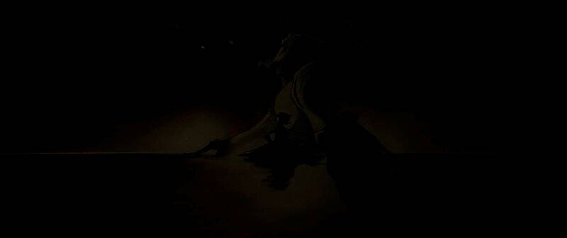 《千年醒》MV截图，沙画风格展现文物从黄沙中浮现，逐渐化为人形的过程