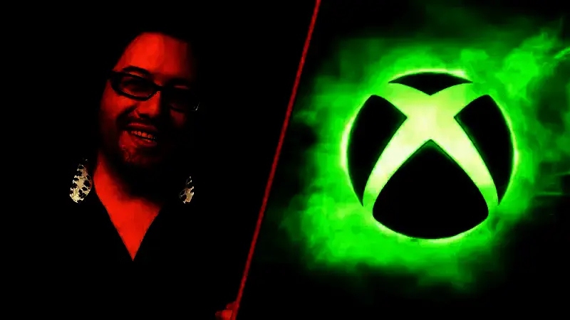 Romero Games工作室团队合影，Brenda与John Romero站在中心，团队成员笑容满面