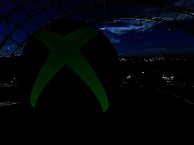 办公室空荡的工位与遗留的开发设备，象征工作室的突然终结