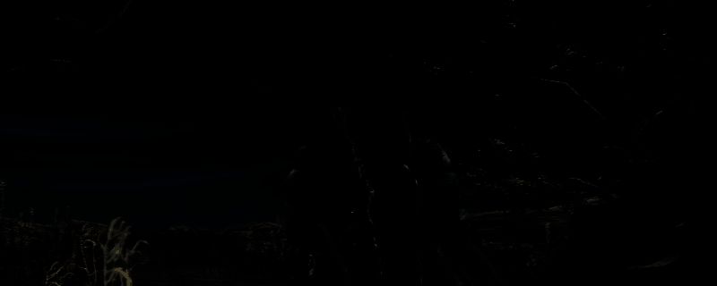 《艾尔登法环：黑夜君临》游戏中魔法师塔外观，古朴石塔矗立于荒原之上，周围环绕着微弱的魔法光晕