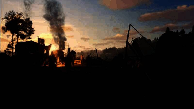 游戏中玩家指挥部队在夜晚作战，火把照亮战场，士兵列阵迎敌，气氛紧张激烈