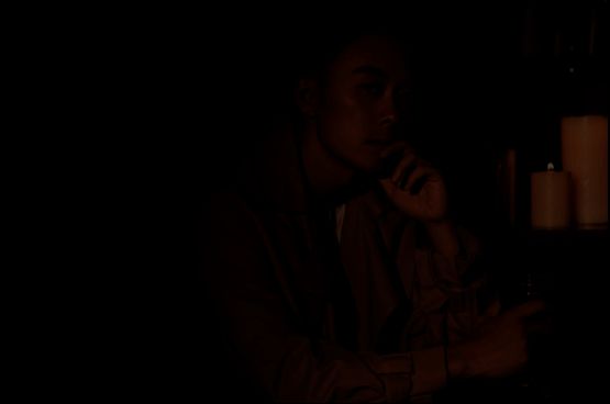 游戏角色‘陆羽’立绘展示，身披战甲的狼族战士，眼神坚毅，背景雷电交加