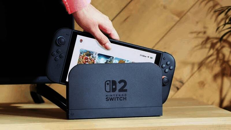 任天堂Switch2主机展示图，背景为玩家使用Joy-Con手柄进行多人联机游戏的场景