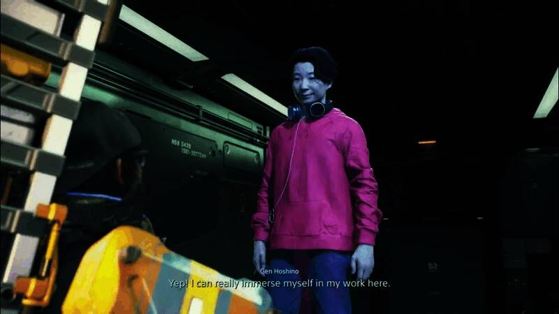 星野源在录音棚内进行动作捕捉，面带微笑，身旁有工作人员调试设备