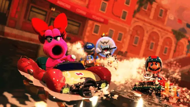 吉田修平在采访中的照片，神情认真，背景为游戏展现场