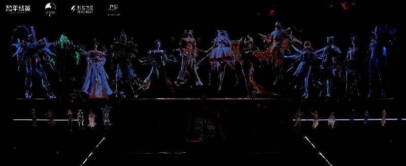 数十位COSER列队站立，身着不同主题皮肤，灯光如星河流转，场面恢弘