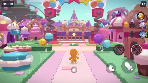 游戏战斗场景截图，多个饼干人角色在绚丽特效中释放技能，画面充满卡通动感