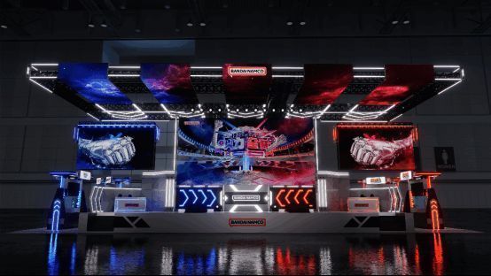 万代南梦宫展区舞台效果图，舞者在霓虹灯光下演绎吃豆人主题舞蹈，科技感十足