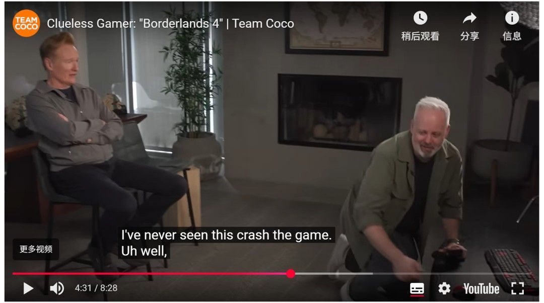 《无主之地4》现场演示画面，主持人柯南正在试玩，屏幕突然黑屏，现场人员露出惊讶表情