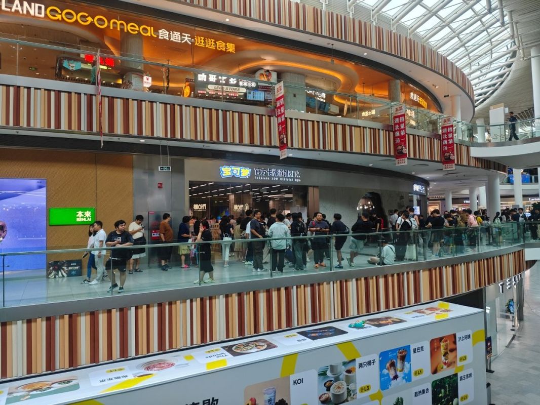 宝可梦官方卡牌道馆北京门店外观，门店装潢风格充满宝可梦元素，吸引众多粉丝驻足