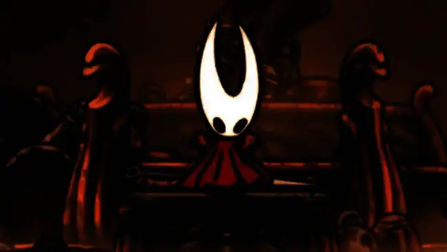 《空洞骑士：丝之歌》游戏封面，背景为神秘洞穴与角色剪影，充满探索氛围