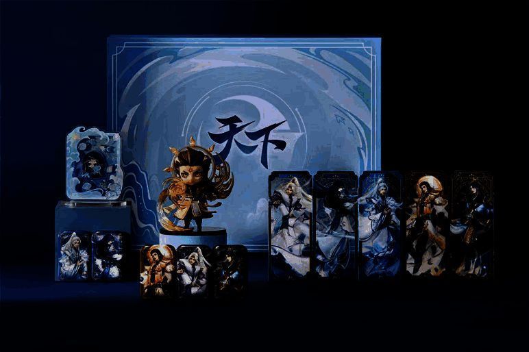 《天下》手游首款实体纪念礼盒外观展示，礼盒封面印有标志性角色与山河图腾，充满国风年节气息