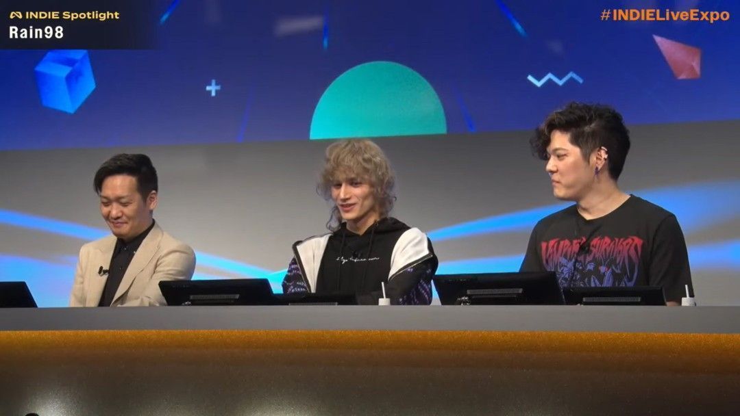 大屏幕上播放着某款独立游戏的实机演示片段，观众席反应热烈