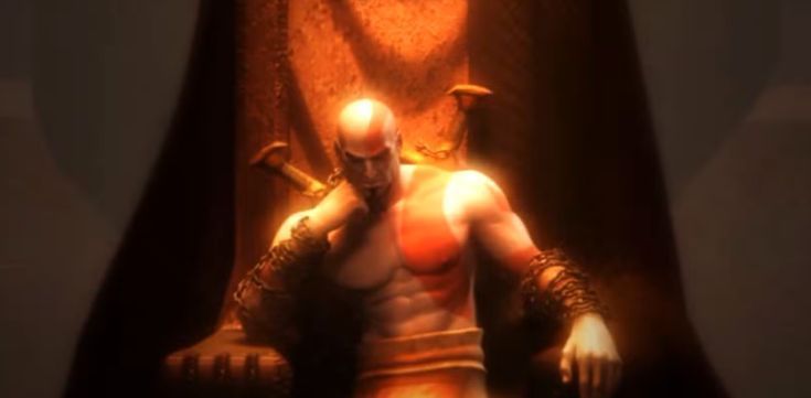 《战神》游戏场景截图，展示奎托斯挥舞利维坦斧劈开敌人，画面充满力量感与视觉冲击力