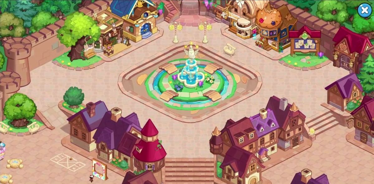 互动广场全景图，多个玩家操控不同造型的饼干形象聚集交谈，背景有NPC饼干发放任务