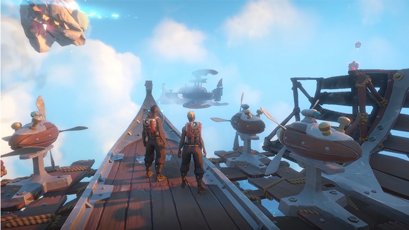 《回音：飞艇传说》开发团队合影，几位年轻开发者在工作室中讨论游戏设计，背景墙上贴满飞艇概念图