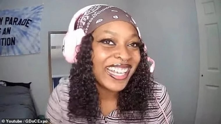 D.I.C.E. 2026峰会主会场实景图，巨型LED屏显示‘ACADEMY OF INTERACTIVE ARTS & SCIENCES’标识，台下坐满西装革履的参会者，氛围庄重而密集