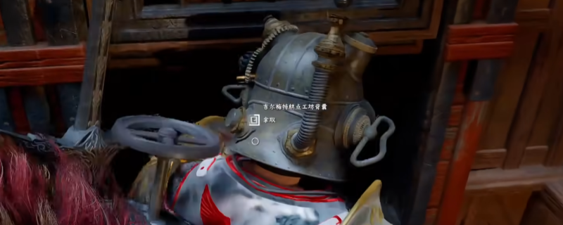 《红色沙漠》游戏内实景：德雷西亚自治领的吉尔梅特糕点工坊酿酒设施外观，灰蓝色调工业建筑群矗立于沙尘弥漫的荒原上，屋顶烟囱隐约飘出淡粉色蒸汽